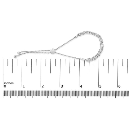 White bracelet with round white gemstones set in a channel setting, shown on a scale from a top-down angle.