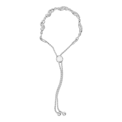 White metal bracelet with round white gemstones in prong settings on curved links, featuring an adjustable slider with two chain tassels, shown from the front on a white background.