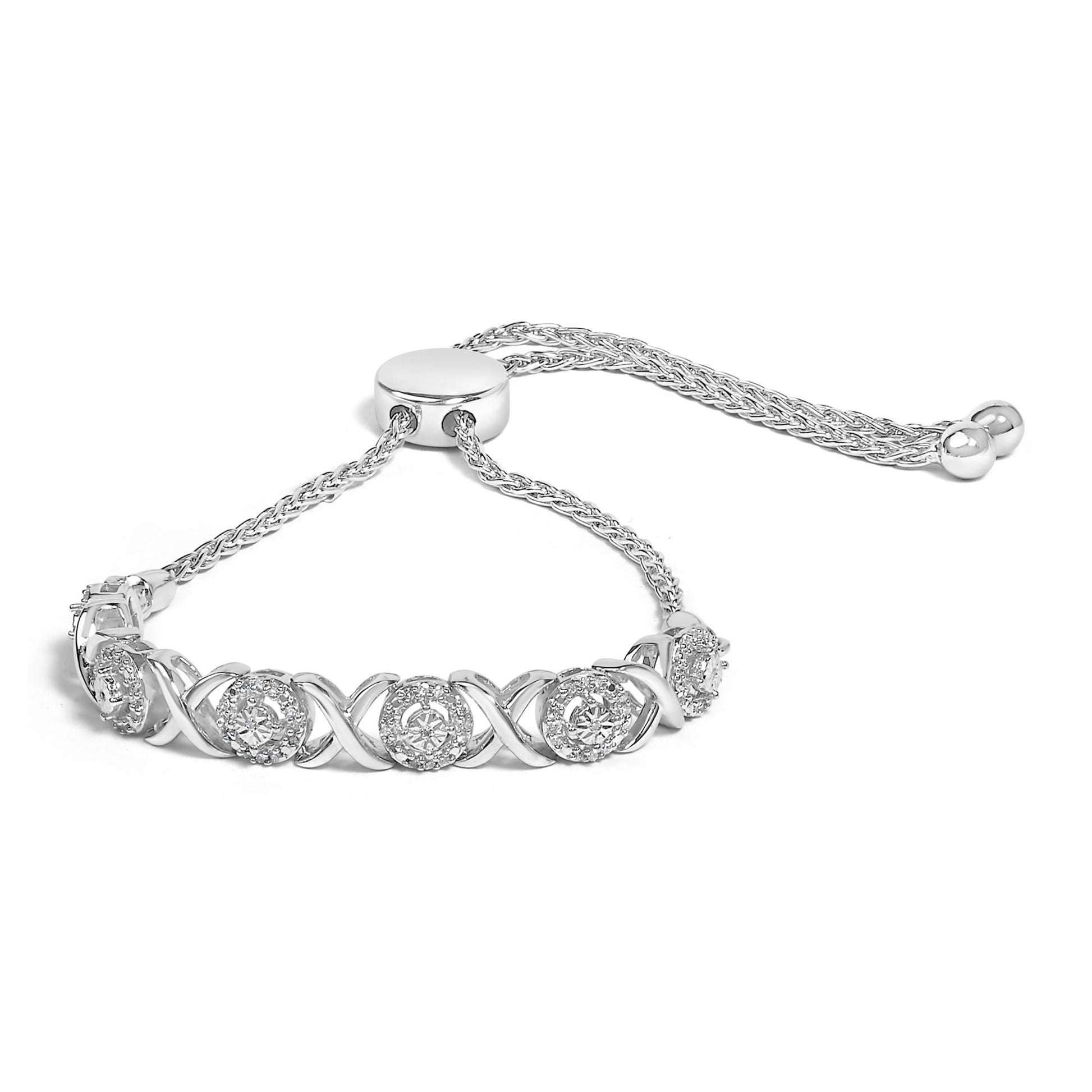 White metal bracelet with an adjustable sliding clasp, featuring alternating round white gemstones in prong settings and crisscross links, shown in a front angled view.