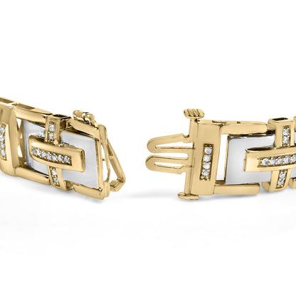Close-up angled view of a yellow and white metal bracelet clasp featuring rectangular links adorned with round white gemstones in a pave setting.