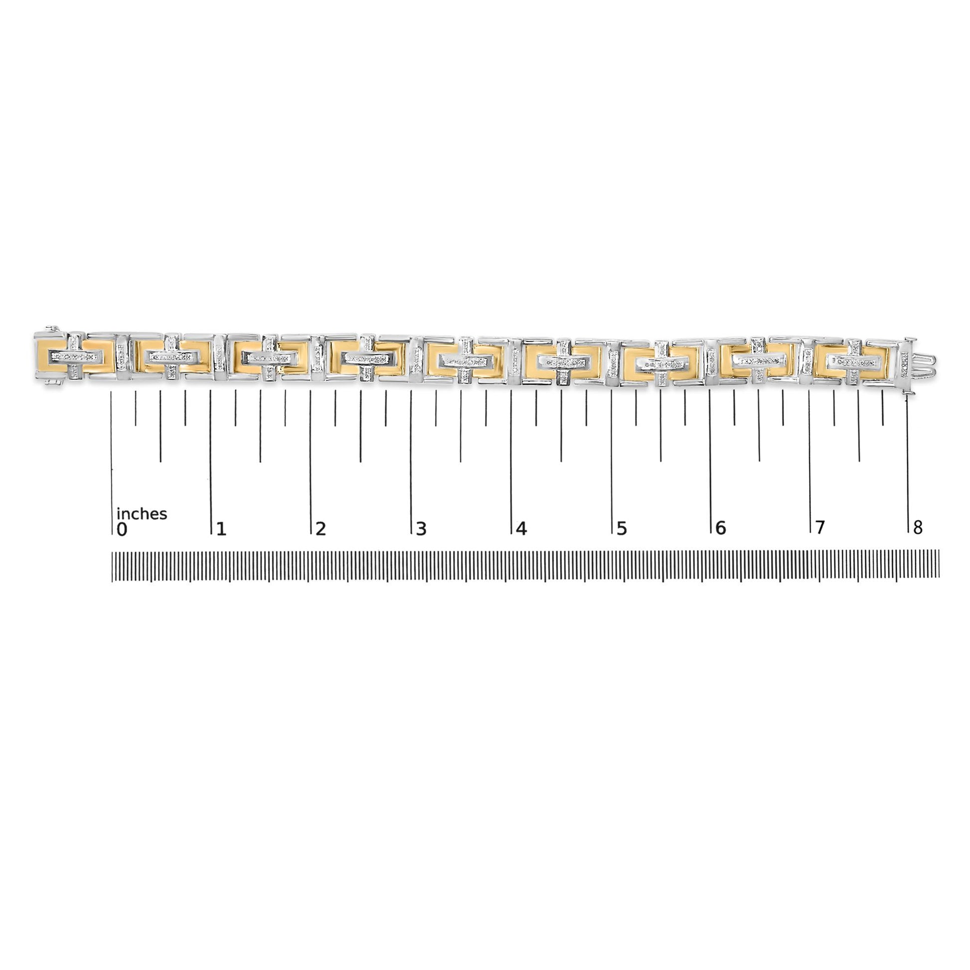 Bracelet with alternating yellow and white metal links and white gemstones in pave setting, shown on a ruler scale from above.