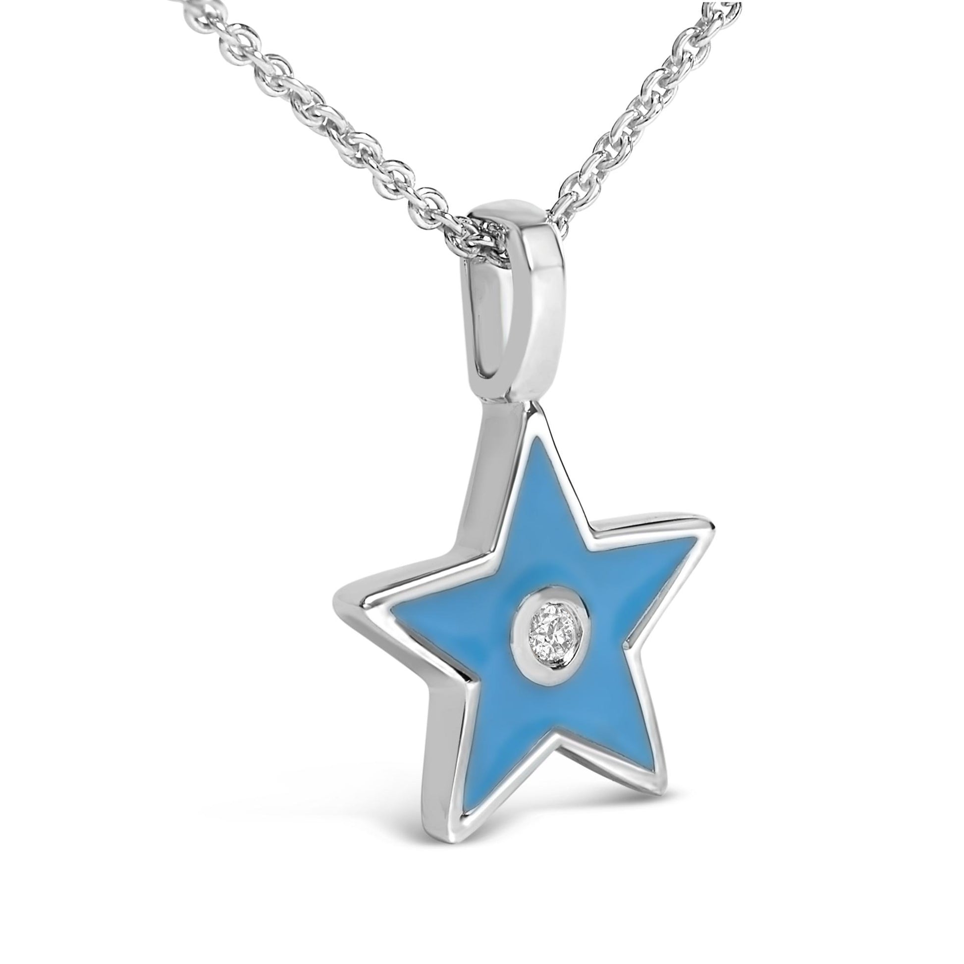 Close-up angled view of a white necklace with a star-shaped pendant featuring blue enamel and a round white gemstone in bezel setting at the center.