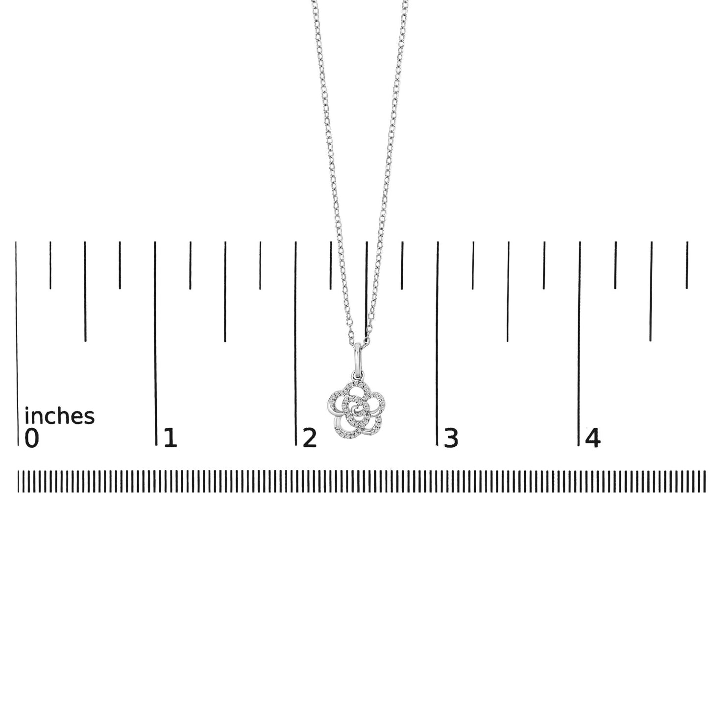 Close-up front view of a white necklace with a flower-shaped pendant, adorned with round white gemstones in a prong setting, shown on a scale.