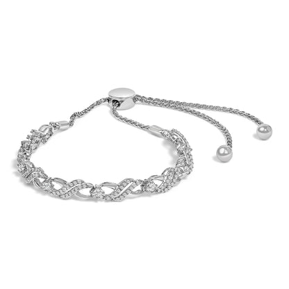 White metal bracelet with round white gemstones set in a twisting pattern, shown at an angled top view.