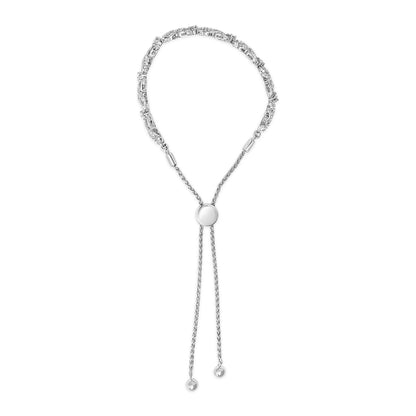 Front-facing view of a white metal bracelet with round white gemstones set in prong settings along the upper half, featuring a sliding clasp and two dangling chain ends with small round metal beads.