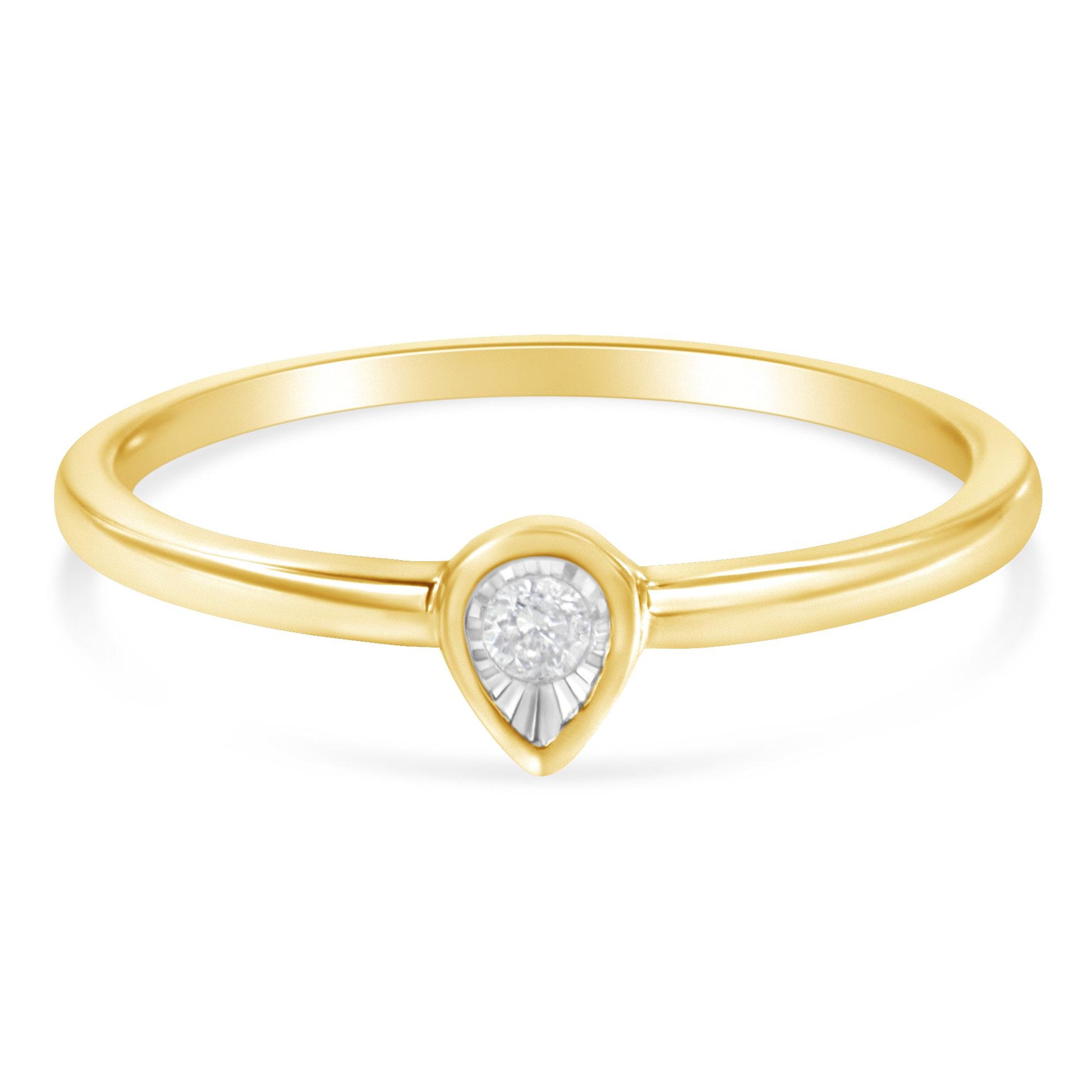 Front angle view of a yellow ring featuring a round white gemstone in a miracle setting.