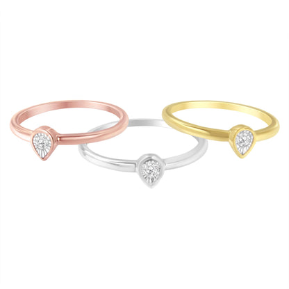 Three rings in yellow, white, and rose metal colors with round white gemstones in a miracle setting, shown in a front angle view.