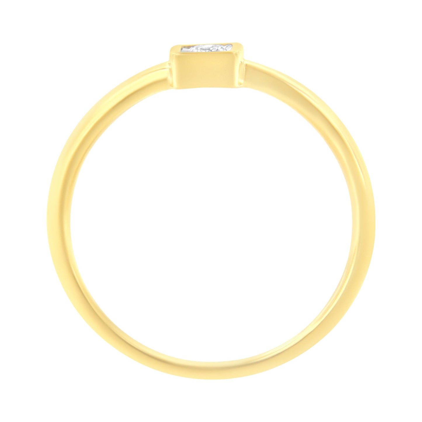 Top view of a yellow metal ring with a single round white gemstone set in a miracle setting.