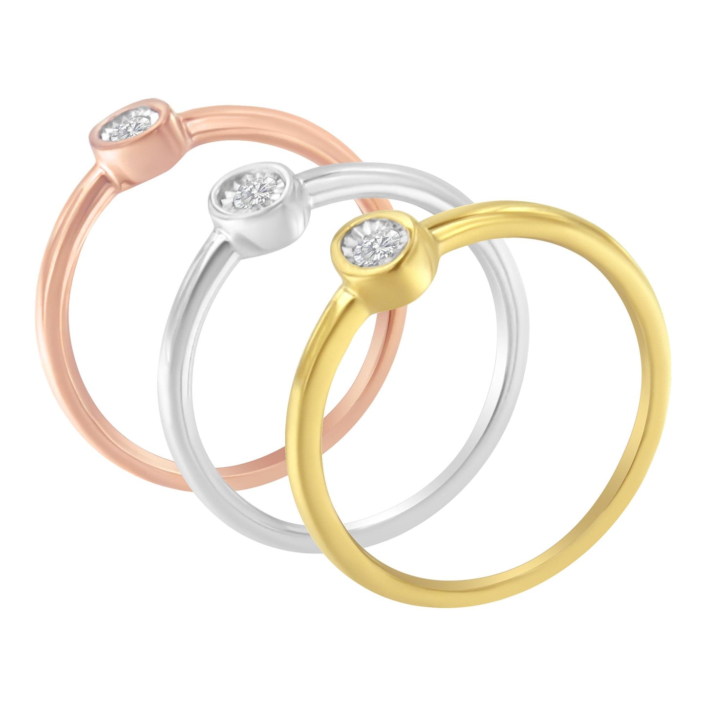 Three rings with yellow, white, and rose metal colors, each featuring a round white gemstone in a bezel setting, shown in a slight top-down angle.