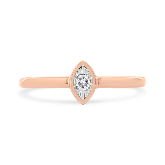 Front-facing view of a rose-colored ring featuring a single round white gemstone in a marquise-shaped setting.
