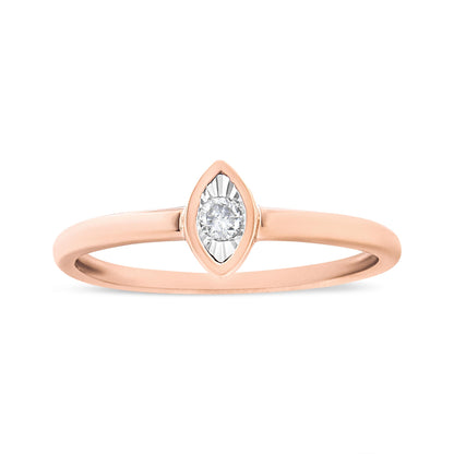 Front view of a rose-colored ring with a single round white gemstone in a miracle setting.