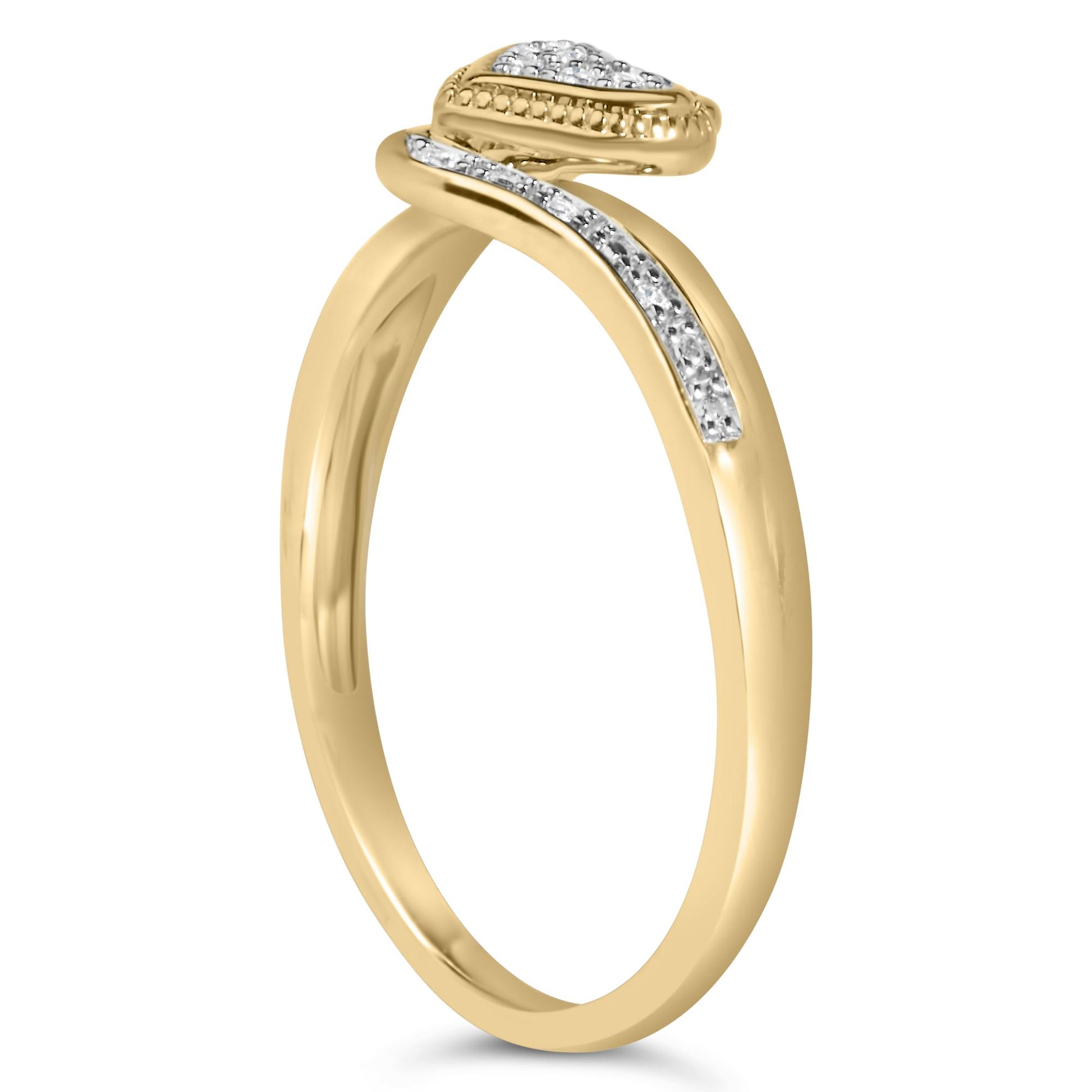Yellow and white ring with a curved band accented by small white gemstones in pave setting, side angle view.