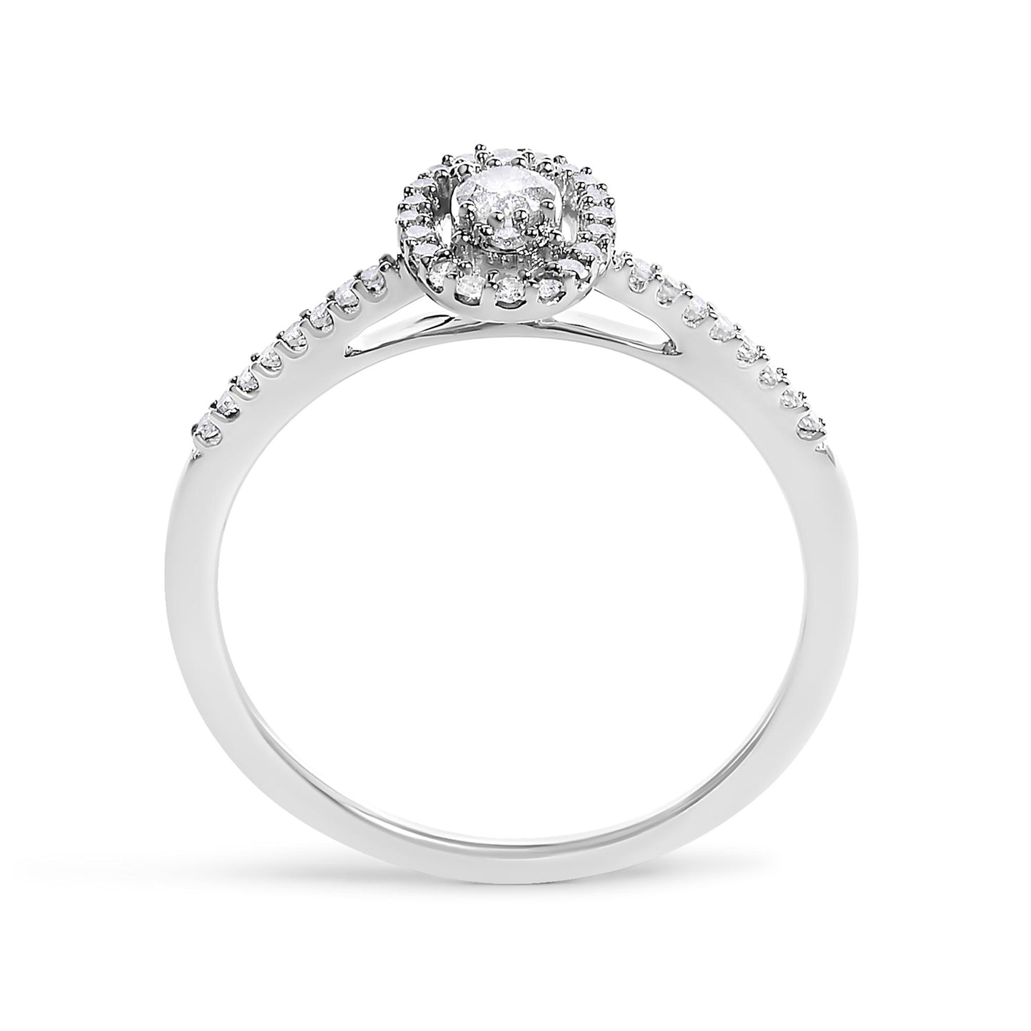 White metal ring shown from the front angle, featuring a round center gemstone in prong setting, surrounded by a halo of smaller white gemstones, and additional white gemstones set along the upper half of the band.