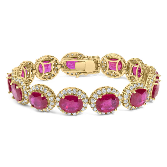 Yellow bracelet shown from a front angle featuring oval red gemstones surrounded by round white gemstones in a prong setting.