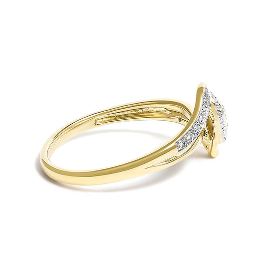 Yellow metal ring with a curved design, featuring white round pave-set gemstones, shown in a close-up angled side view.