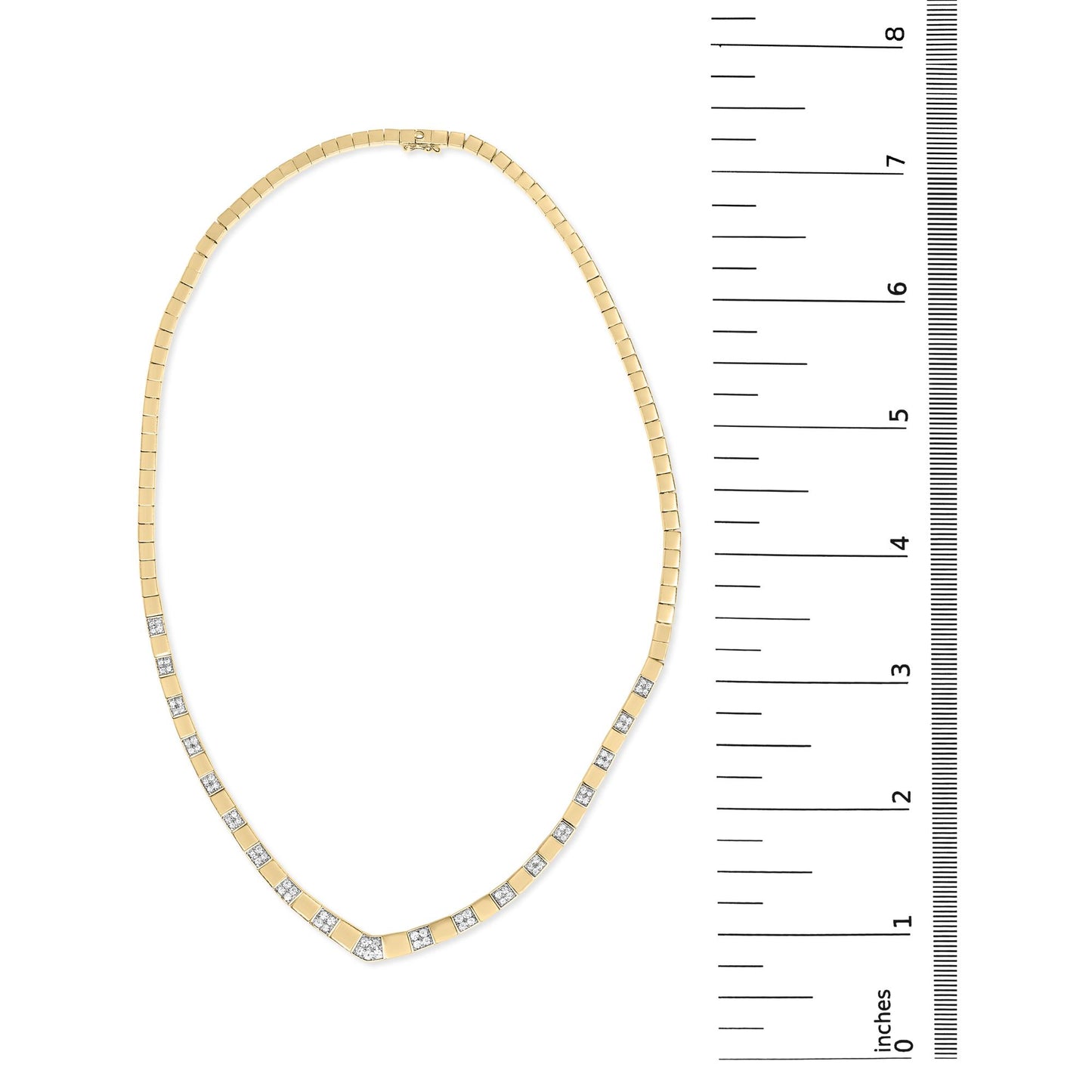 Top-down view of a yellow metal necklace with evenly spaced white round gemstones in 4-prong settings, displayed next to a ruler for size reference.