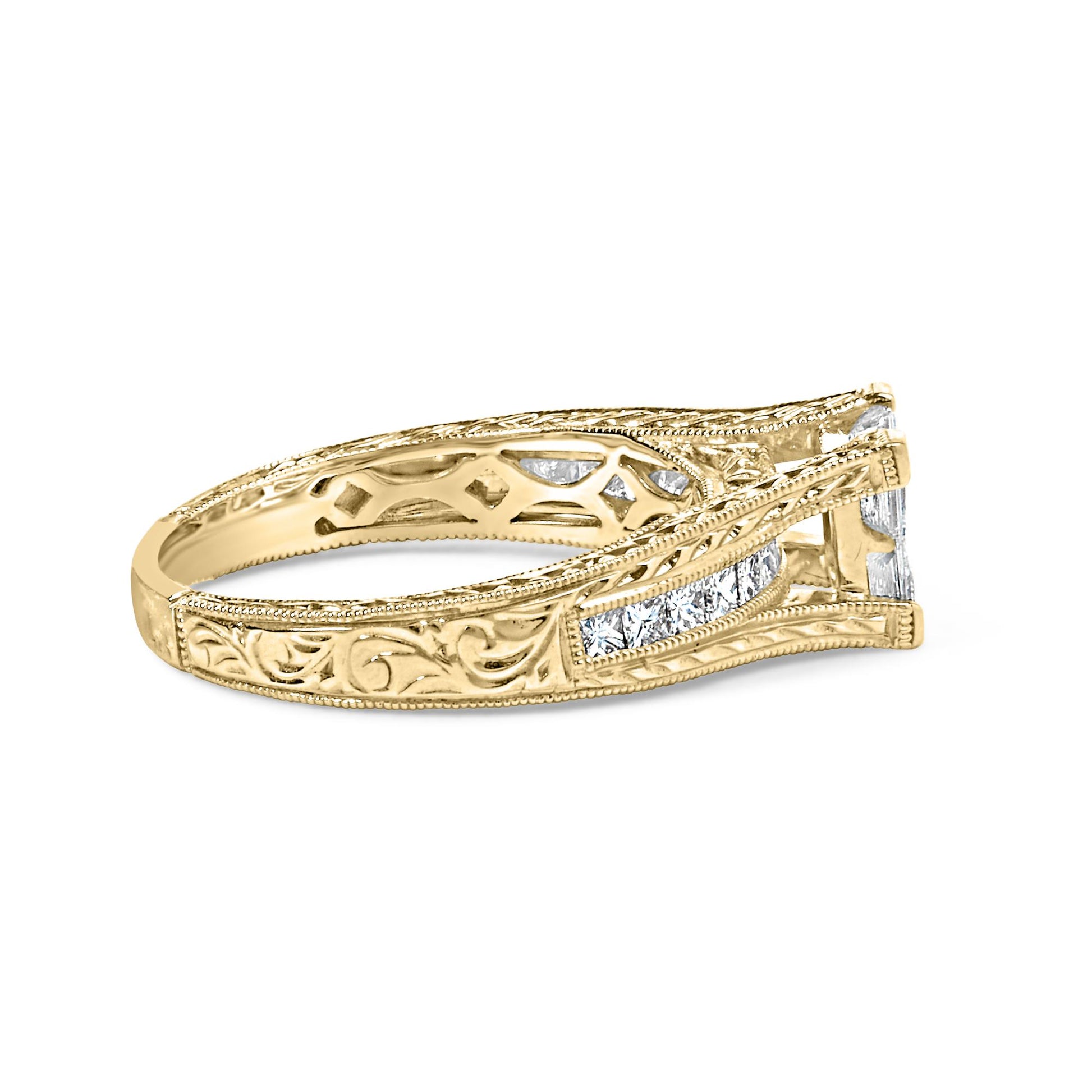 Side angle view of a yellow ring with intricate engraving and white princess shape gemstones in invisible and channel settings along the band.