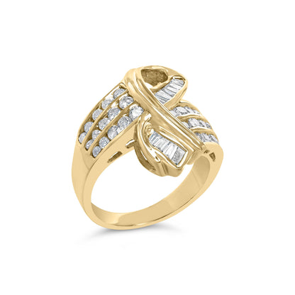 Yellow metal ring with round and baguette white gemstones in channel settings, shown at an angled front view.