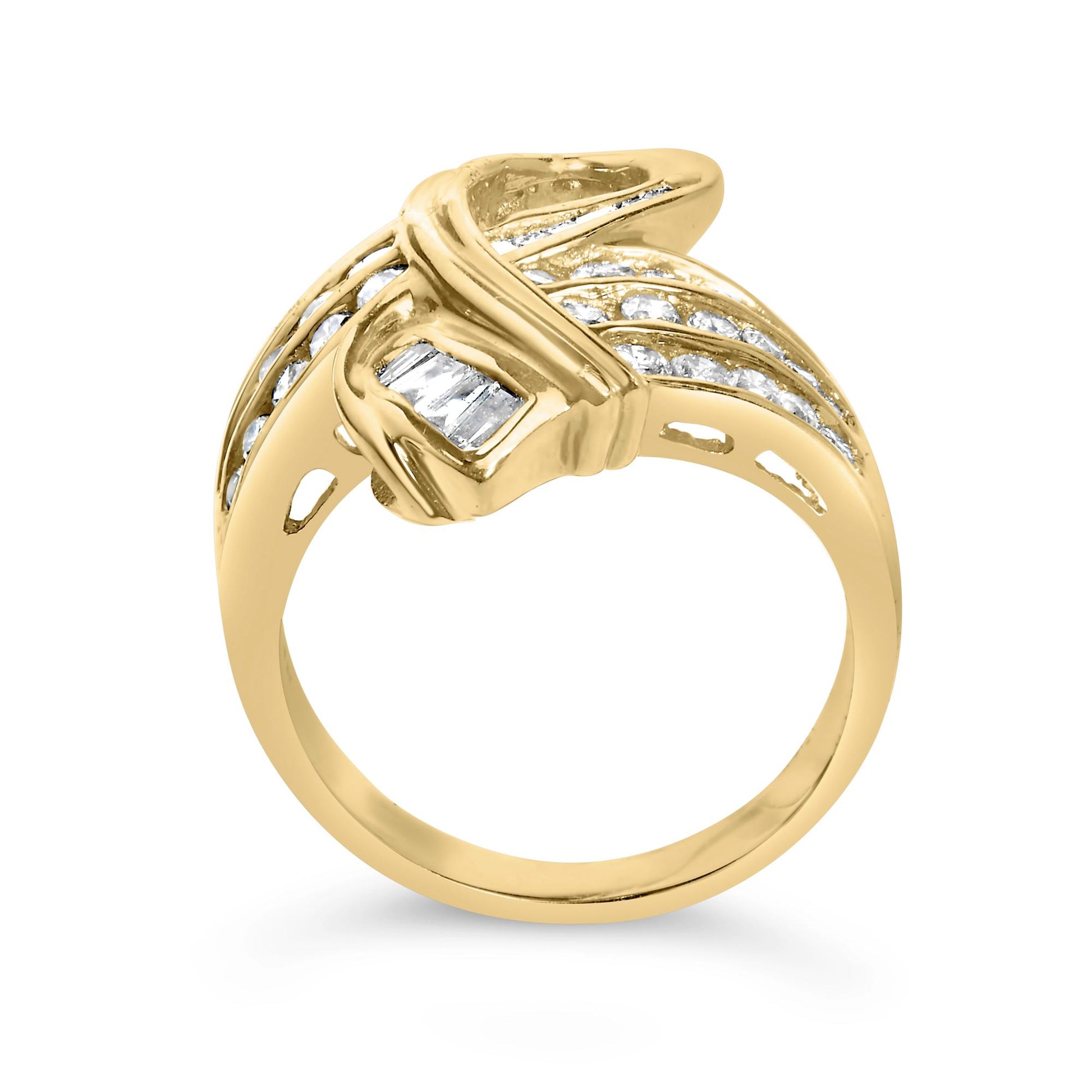 Yellow metal ring with a crisscross design, featuring channel-set white round and baguette-shaped gemstones, shown from a front angle on a white background.