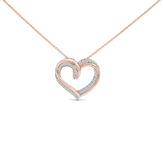 Close-up front view of a heart-shaped necklace pendant with a white and rose metal design and round white gemstones in prong settings, shown against a white background.