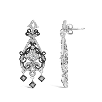 Pair of white and black metal earrings with intricate scrollwork design, featuring invisible-set princess and round white gemstones, and prong-set round white gemstones, shown from front and side angles.