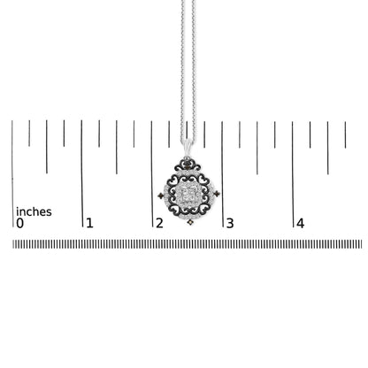 Necklace shown on a scale, featuring a white and black metal pendant with a square white gemstone center, surrounded by round white gemstones and four black round gemstones in a decorative circular design, shot from the front.