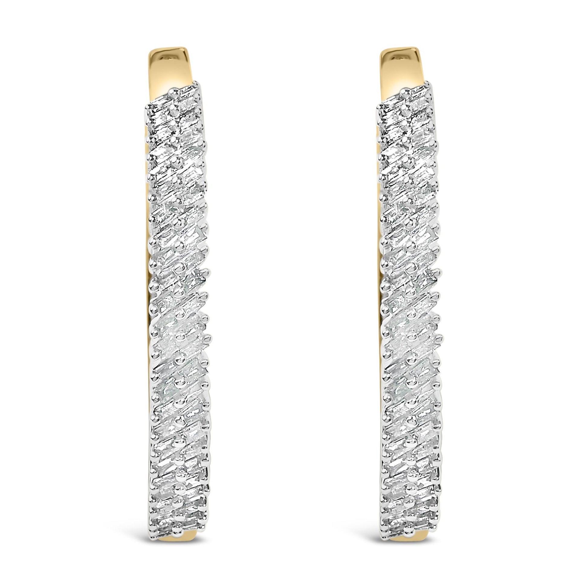 Pair of elongated hoop earrings shown from the front angle, featuring intertwined yellow and white metal with rows of small white baguette-shaped gemstones in prong settings on the white metal section.
