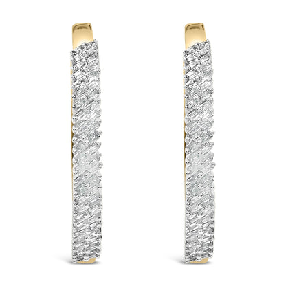 Pair of elongated hoop earrings shown from the front angle, featuring intertwined yellow and white metal with rows of small white baguette-shaped gemstones in prong settings on the white metal section.
