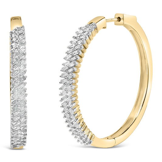 Close-up front and side view of yellow and white metal hoop earrings with white baguette-shaped gemstones set in prongs along the outer curve.