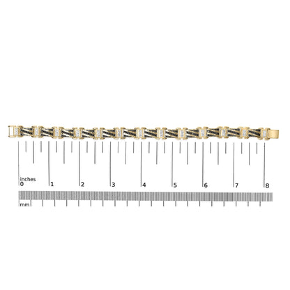 Yellow, white, and black bracelet with alternating black pavé-set and white prong-set round gemstones, shown flat on a ruler for scale, top-down view.