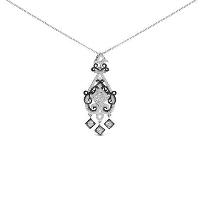 Front view of a white and black metal necklace with a pendant featuring princess and round shaped white gemstones in various prong settings and intricate scrollwork, displayed against a white background.