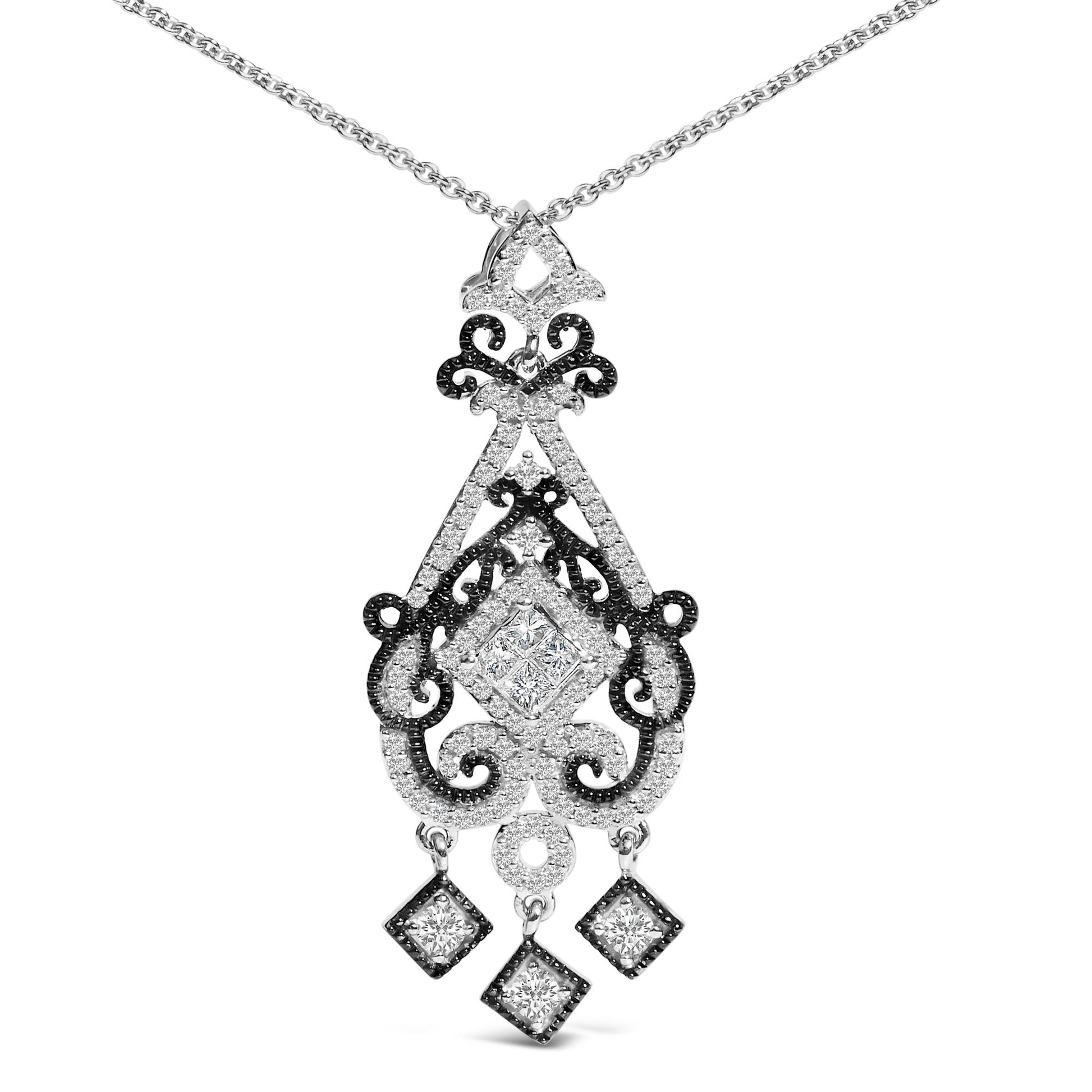 Close-up front view of a white and black metal necklace with an ornate pendant featuring a central cluster of white princess-shaped gemstones in invisible settings, surrounded by intricate scrollwork accented with small round white gemstones, and three hanging diamond-shaped charms each set with a round white gemstone.