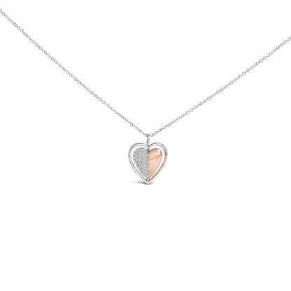 Close-up front view of a heart-shaped necklace pendant with one half featuring white gemstones in prong settings and the other half in a smooth rose-colored finish, hanging on a white-colored chain.