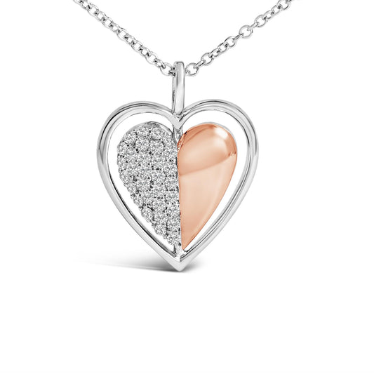 Close-up front view of a heart-shaped necklace pendant with a white metal frame. One half of the heart is smooth and rose-colored, while the other half is studded with small white gemstones in a prong setting. The pendant hangs from a white metal chain against a white background.