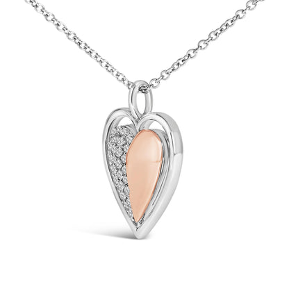 Close-up front angle of a heart-shaped necklace pendant with a white and rose-colored design, featuring one side adorned with small round white gemstones in a prong setting, hanging from a chain.