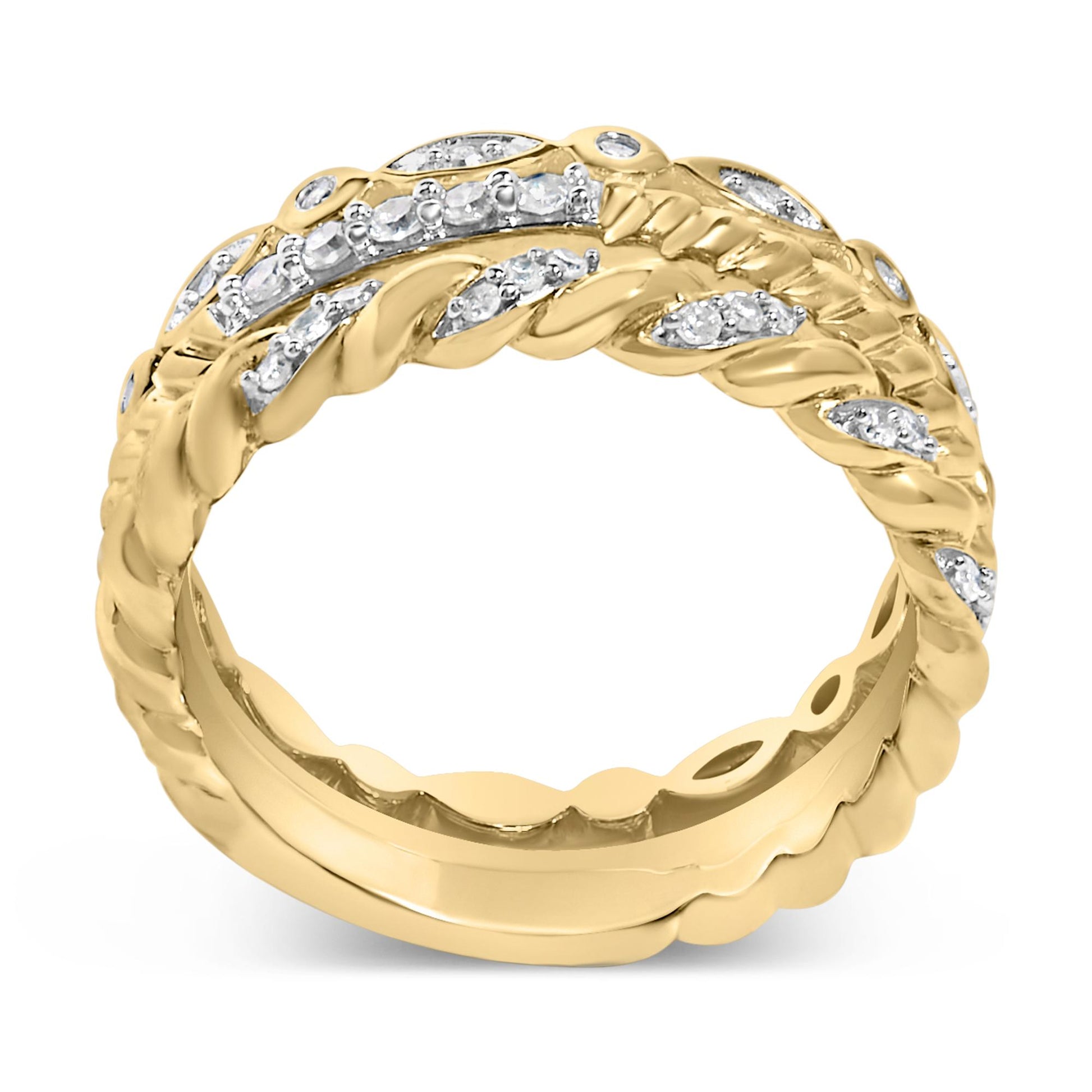 Close-up front angle of a yellow and white ring with twisted design accents and round white gemstones in pave setting.