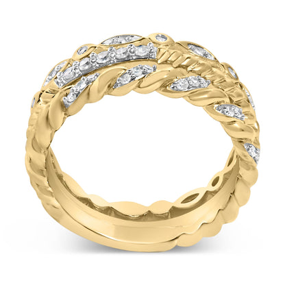 Close-up front angle of a yellow and white ring with twisted design accents and round white gemstones in pave setting.