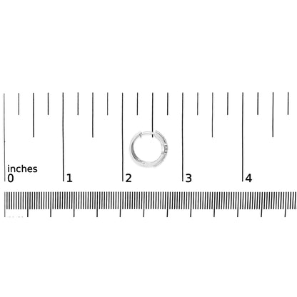 White metal hoop earring with round white gemstones in pave setting, shown on a scale from top view.