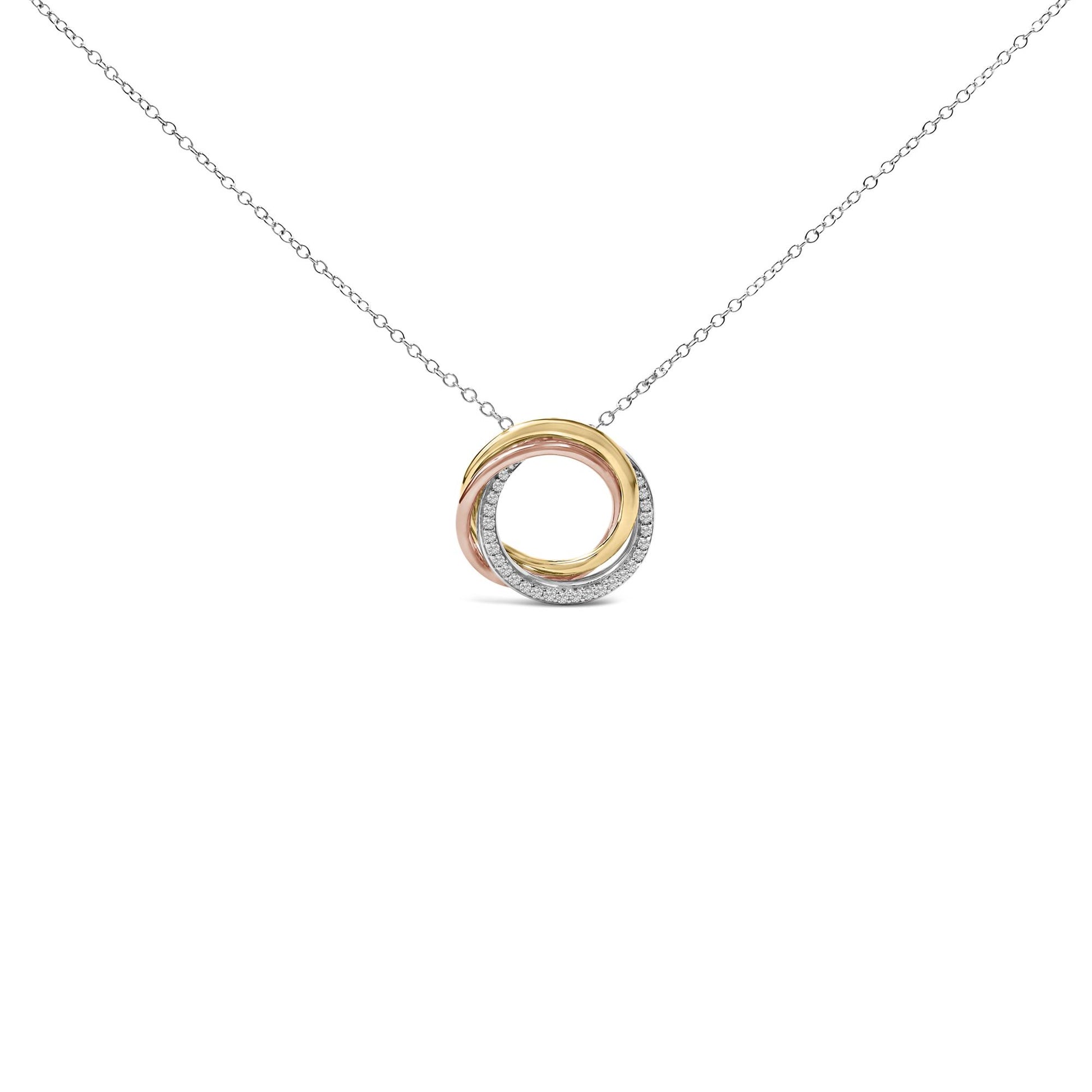 Front view of a white metal necklace with an interlocking circular pendant featuring three bands, one band set with white round gemstones.