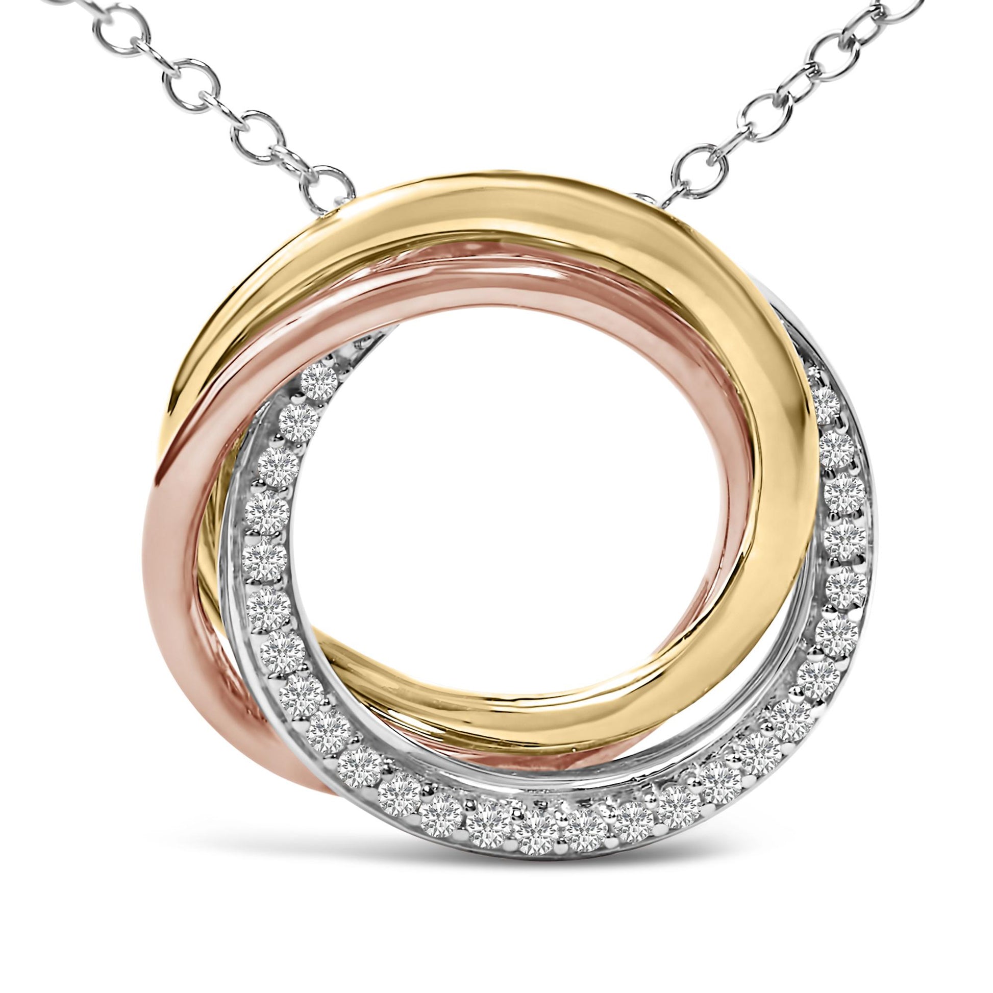 Close-up front angle of a necklace pendant featuring three interlocking circular bands in white, yellow, and rose tones, with the white circular band adorned with small round white gemstones in a shared prong setting.
