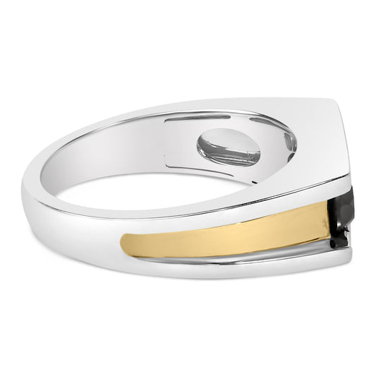 Close-up side angle of a ring featuring a combination of yellow, white, and black metal colors, with a tapered design and three round black gemstones set in a channel setting.