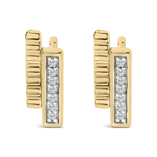 Pair of yellow metal earrings shown front-facing, each with a vertical rectangular bar inset with small round white gemstones in a pave setting and textured detailing on the side.