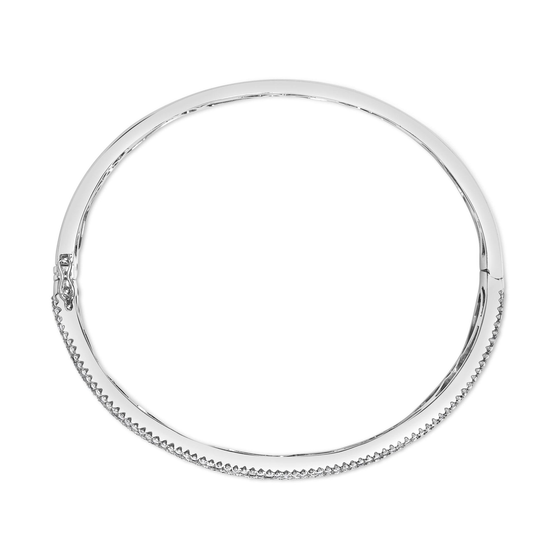 Top-down view of a white metal bracelet with round white gemstones set along one side and a clasp on the left side.