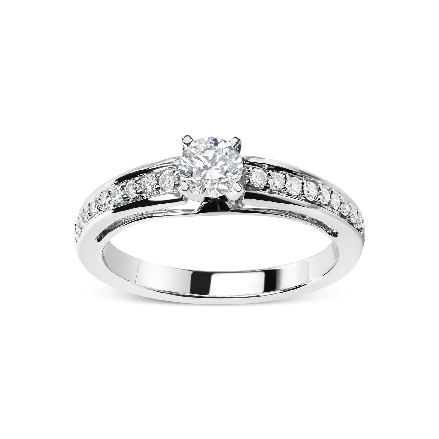 Front angle of a white metal ring featuring one round white gemstone in a four-prong setting and multiple smaller round white gemstones in shared prong settings along the band.