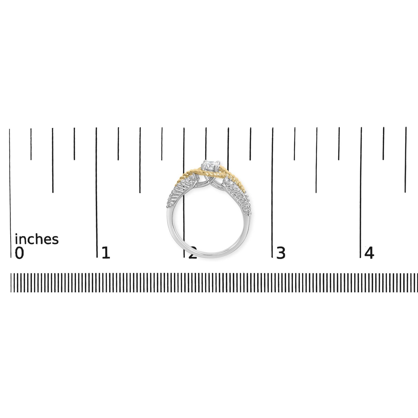 Ring with yellow and white metal bands featuring a round white gemstone in a 4-prong setting and smaller round white gemstones in a shared prong setting, shown from the side on a ruler for size reference.