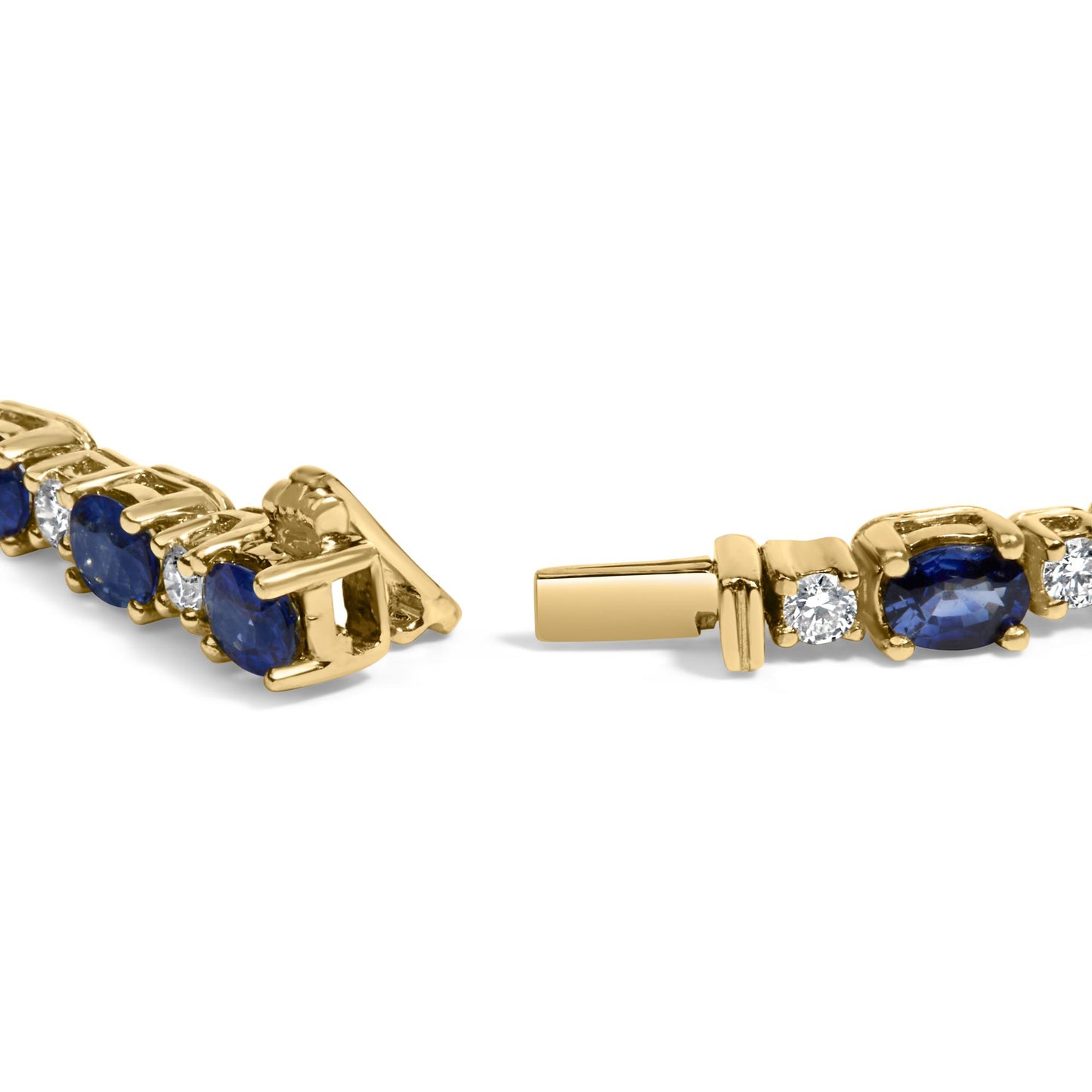 Close-up angled view of a yellow metal bracelet featuring alternating blue oval gemstones and white round gemstones in 4-prong settings.