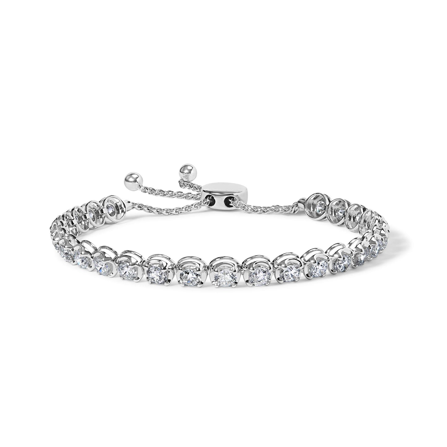 White metal bracelet with round white gemstones in 4-prong settings, shown in a close-up front angle.
