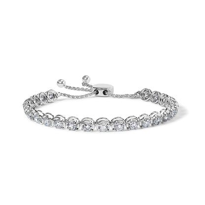 White metal bracelet with round white gemstones in 4-prong settings, shown in a close-up front angle.