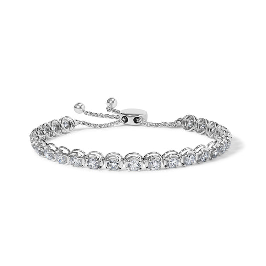 White metal bracelet with round white gemstones in 4-prong settings, shown in a close-up front angle.