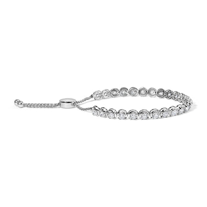 White metal bracelet with round white gemstones in 4-prong settings shown from a side angle.